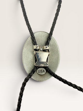 Silver “M” Bolo Tie